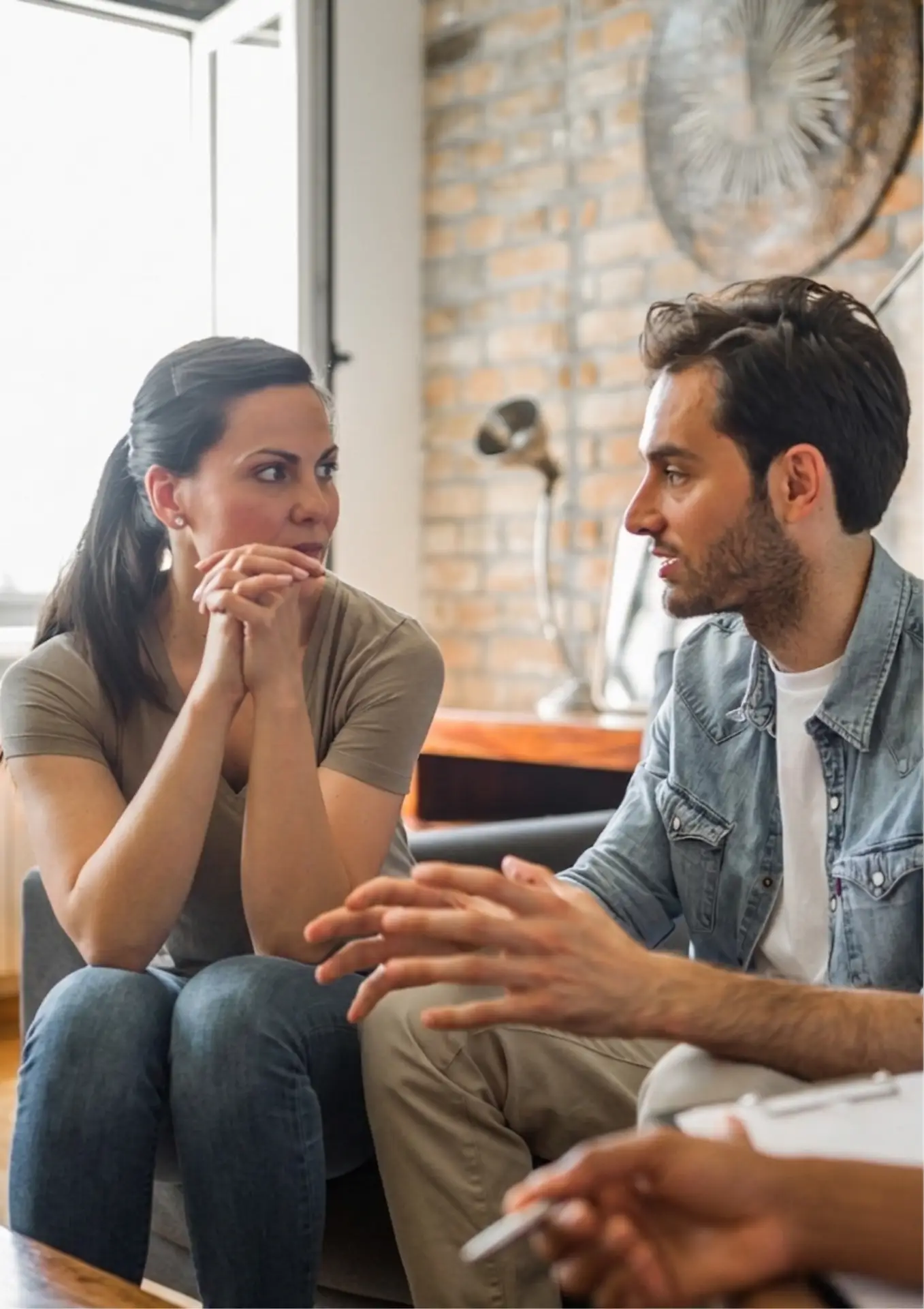 couple discussing with coach