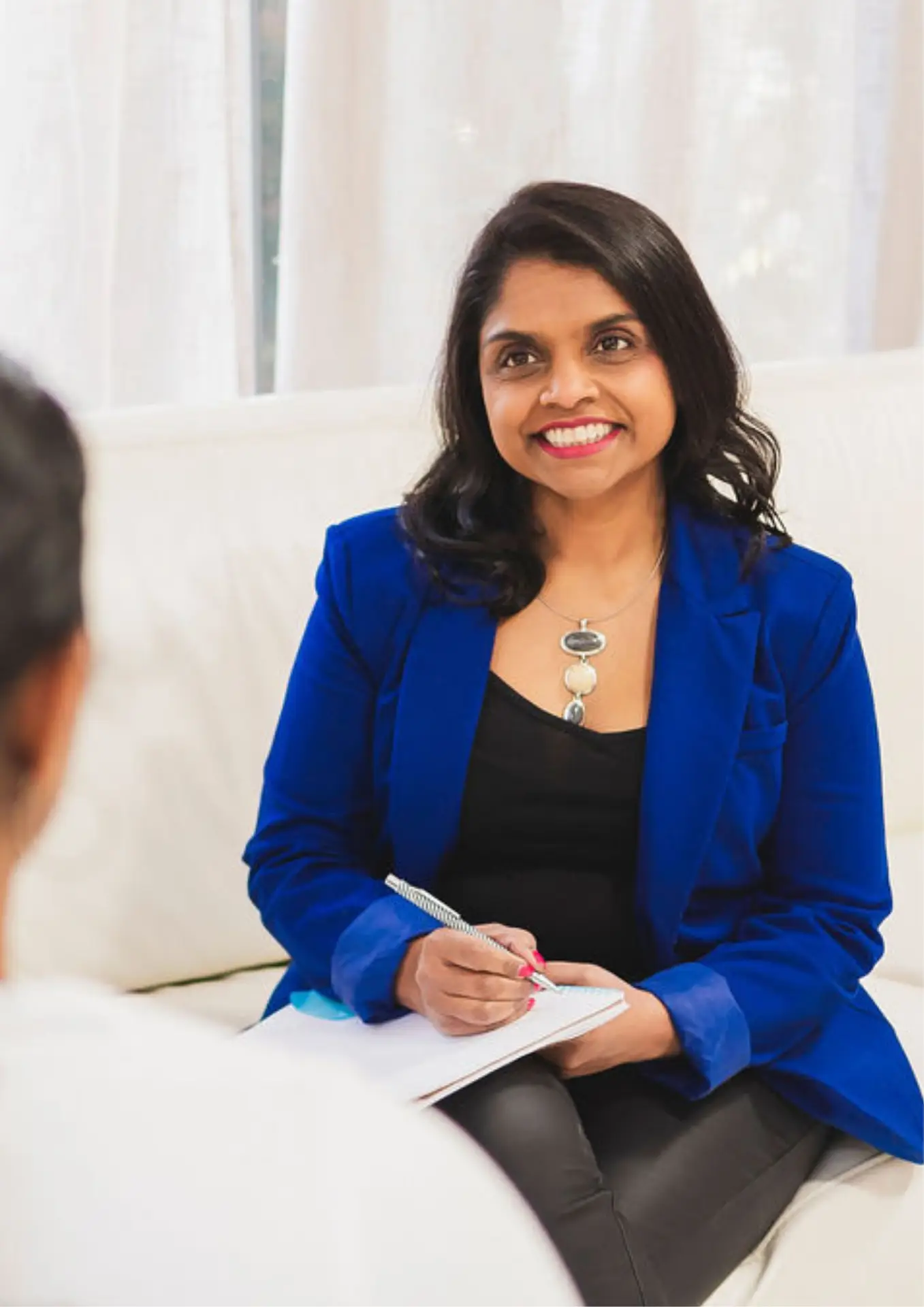 Yolanda having a chat with a client